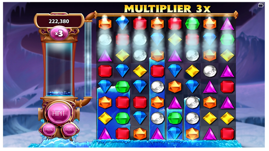 Colorful gems on a game grid with "Multiplier 3x" and score 222,380. Frosty background, hint button, and menu options visible.