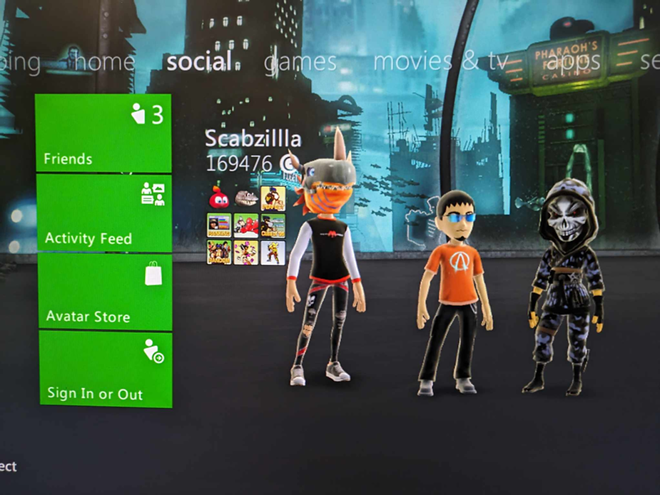 Three animated avatars stand in front of a futuristic city backdrop. Green menu to the left shows Friends, Activity Feed, and Avatar Store.